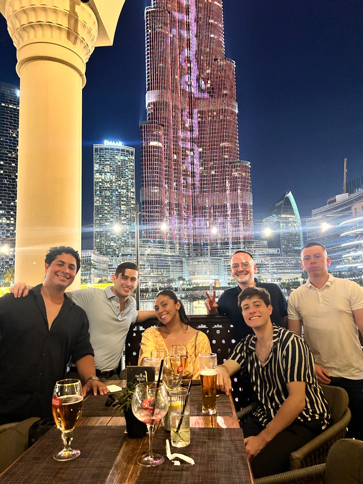 Meeting South American candidates with a view of the Burj Khalifa at night